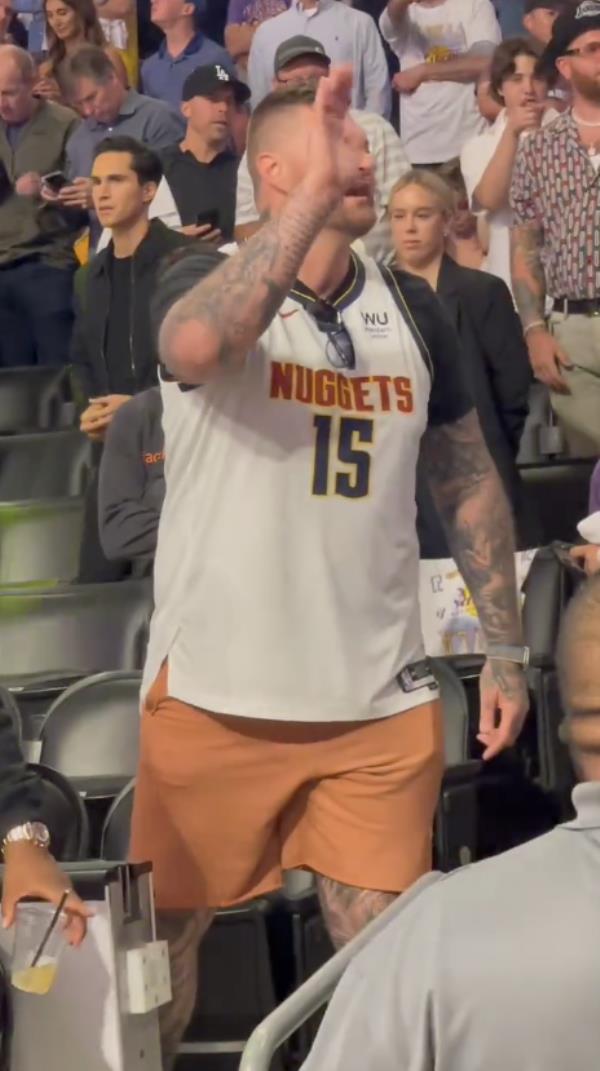 Nikola Jokic's brother waves bye-bye to Jack Nicholson.