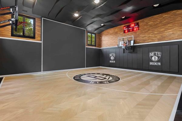 Interior fo a basketball court at the home. 