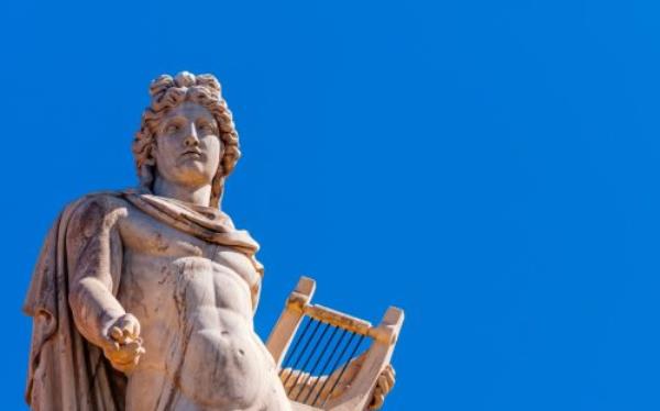 statue of ancient greek god apollo in athens greece