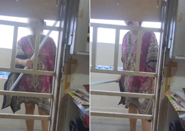 'My baby is sleeping': Woman screams at neighbour, uses pole to hit her door repeatedly