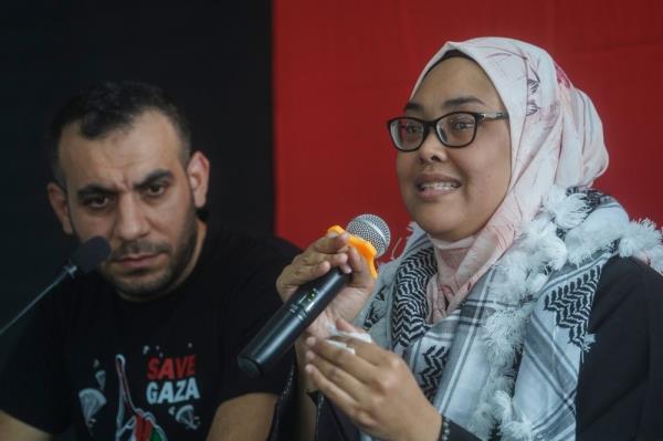 Malaysian Nurul Ain, husband to co<em></em>ntinue to help Palestinian people after evacuation from Gaza