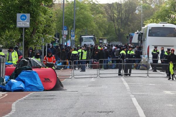 Asylum seekers being placed on coaches in Dublin city centre