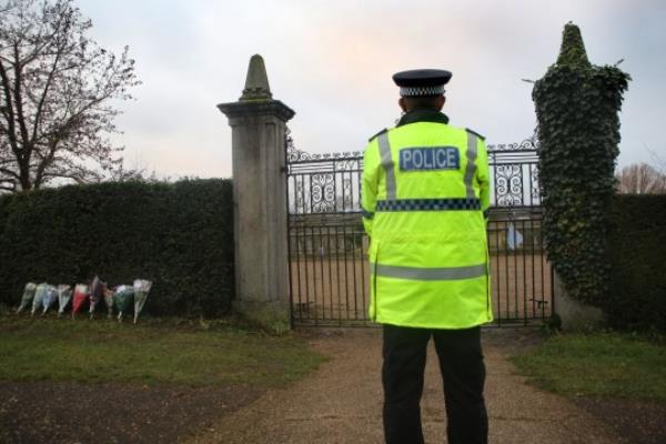 NORWICH, ENGLAND - DECEMBER 16: A police officer stands guard outside the park as it co<em></em>ntinues to be shut to the public and as floral tributes are left at the park gates following the discovery of a body in the search for missing mother-of-three Gaynor Lord, on December 16, 2023 in Norwich, England. Police divers searching for missing Norfolk mother, Gaynor Lord, recovered a body from the River Wensum yesterday. Lord's family have been informed and police say there is no third party involvement. (Photo by Martin Pope/Getty Images)