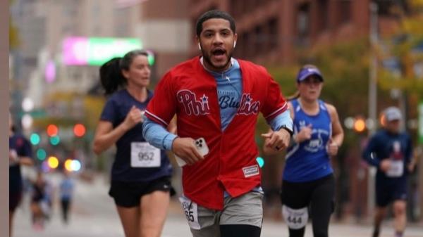 Christopher Fitzgerald runs in a race