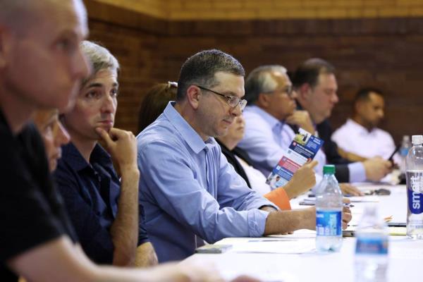 32nd Ward committeeperson Ald. Scott Waguespack, center, prepares to co<em></em>nduct in-person interviews at the Hamlin Park field house in Chicago on Monday, July 10, 2023, to fill the vacancy created by the resignation of Sen. Cristina Pacione-Zayas. 