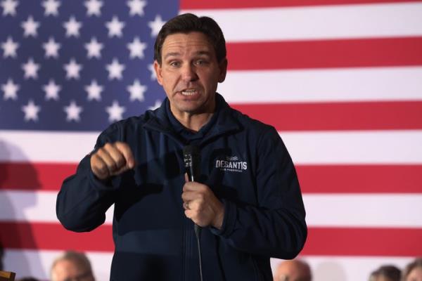 NEWTON, IOWA - DECEMBER 02: Republican presidential candidate Florida Governor Ron DeSantis speaks to guests during a campaign rally at the Thunderdome on December 02, 2023 in Newton, Iowa. Iowa Republicans will be the first to select their party's nominee for president when they go to caucus on January 15, 2024. (Photo by Scott Olson/Getty Images)