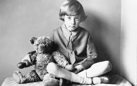 A?A Milne’s son Christopher Robin with his teddy bear, circa 1925