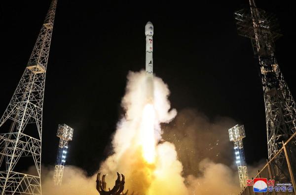 North Korea says spy satellite launch successful