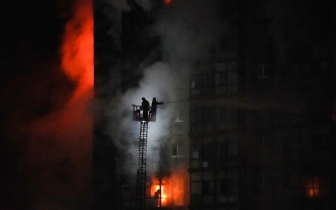 Firefighters tend to a blaze at the scene of an explosion from a vehicle crash in Ulaanbaatar, the capital of Mo<em></em>ngolia on January 24, 2024