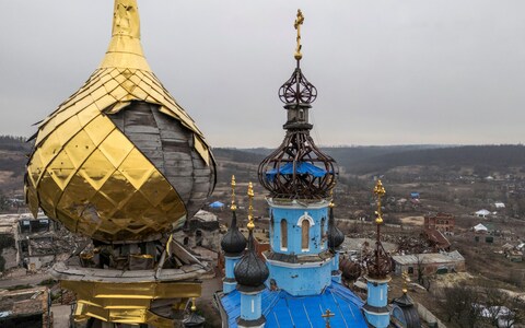 The o<em></em>nion domes of an orthodox church partly survive devastation in the village of Bohorodychne, in the Do<em></em>netsk region