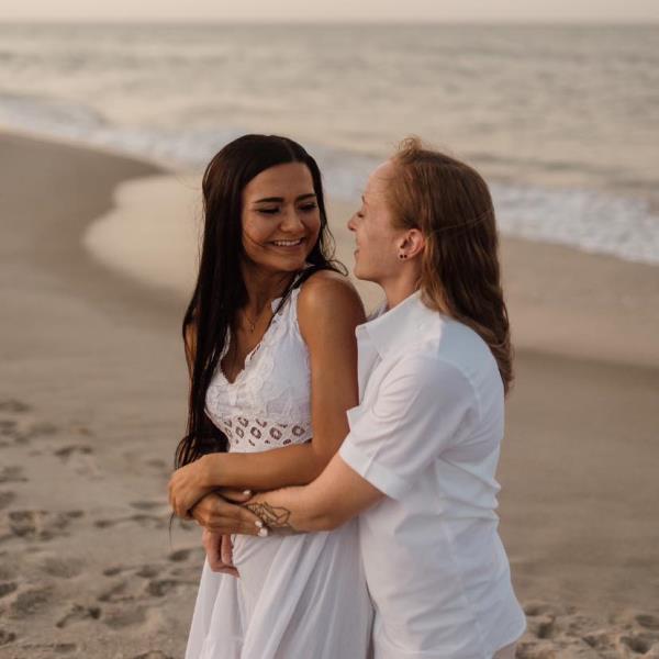 The couple on a beach. 