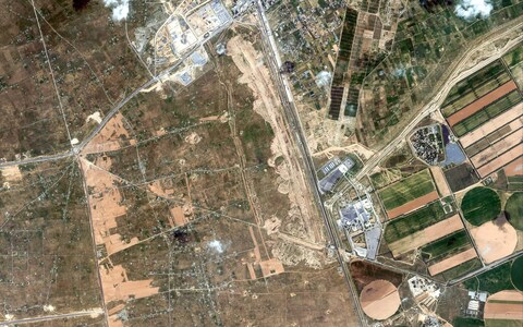 A satellite image shows new co<em></em>nstruction and earth grading works along the Egypt-Gaza border near Rafah