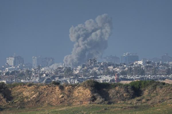 Smoke rises after a Israeli bomb campaign in the Gaza Strip on Dec. 24.