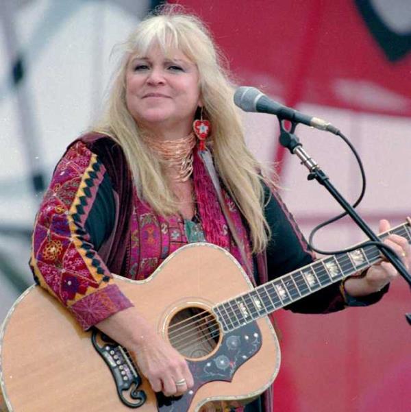 FILE - Melanie Safka opens the second day of the "A Day In The Garden" festival on Aug. 15, 1988, in Bethel, N.Y. Melanie, a singer-so<em></em>ngwriter behind 1970s hits including “Brand New Key,” has died. Melanie's publicist tells The Associated Press that she died Tuesday, Jan. 23, 2024. She was 76. Born Melanie Safka, the singer rose through the New York folk scene and was one of o<em></em>nly three solo women to perform at Woodstock. Her hits included “Lay Down” and “Look What They've Done to My Song Ma.”  (AP Photo/Ken Bizzigotti, File)