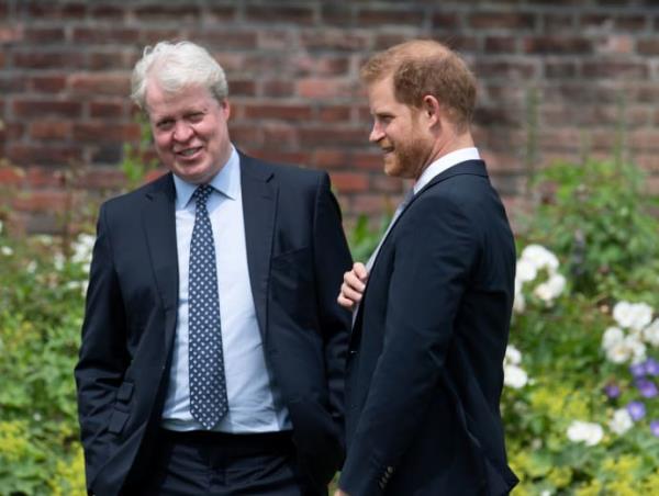 Britain's Prince Harry, Duke of Sussex, talks with his uncle Charles Spencer, 9th Earl Spencer, during the unveiling of a statue commissio<em></em>ned of his mother Diana, Princess of Wales, in the Sunken Garden at Kensington Palace, London, Britain July 1, 2021.