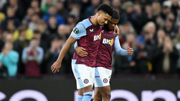 Aston Villa's Ollie Watkins (L) is co<em></em>nsoled by teammate Leon Bailey