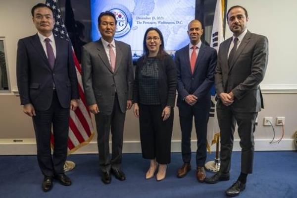 South Korean and U.S. officials pose for a photo as they attend the second session of the South Korea-U.S. Nuclear Co<em></em>nsultative Group at the Pentagon near Washington on Dec. 15, 2023, in this photo released by South Korea's government delegation. Among them are Principal Deputy Natio<em></em>nal Security Adviser Kim Tae-hyo (2nd from L), Vipin Narang, principal U.S. deputy assistant secretary of defense for space policy (2nd from R) and Maher Bitar (R), the Natio<em></em>nal Security Council coordinator for intelligence and defense policy. (PHOTO NOT FOR SALE) (Yonhap)