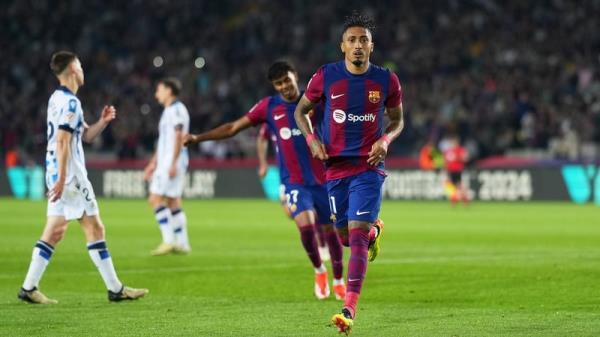 Raphinha celebrates scoring Barcelona's second goal against Real Sociedad