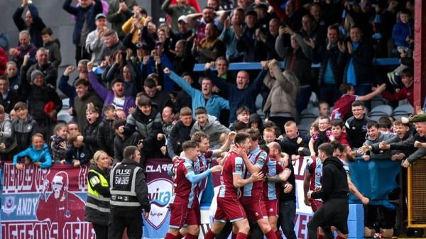 Drogheda players and supporters celebrating a memorable injury-time winner of the Louth derby