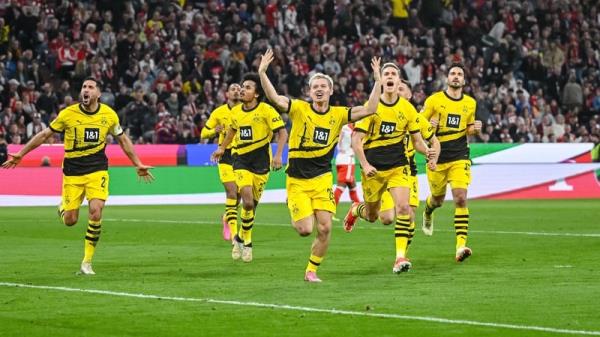 Julian Ryerson celebrates scoring Die Schwarzgelben's second goal in the win over Bayern