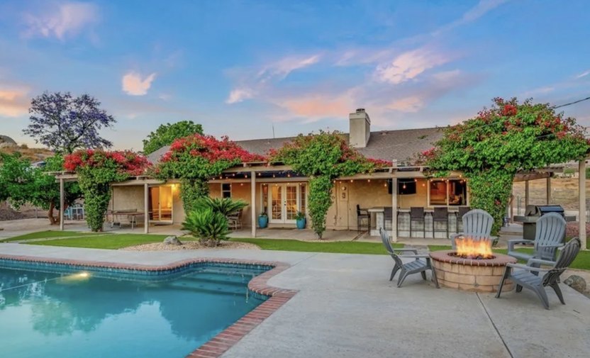 Riverside, CA, home with pool in foreground