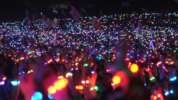 The crowd at Coldplay's headline set at Glasto<em></em>nbury Festival. Pic: PA