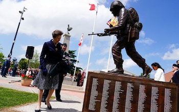 Britain's Princess Royal Anne attends a ceremony of unveiling of a statue of a Second World War Canadian Royal Regina Rifleman 