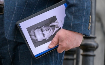 The order of service for the memorial featured a picture of Amis