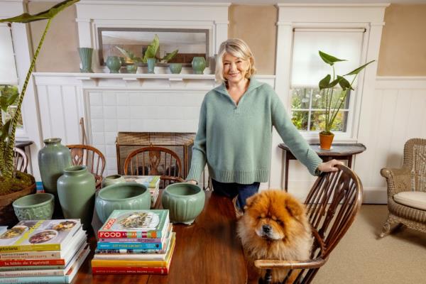 Martha Stewart with her pooch in the dining room. 