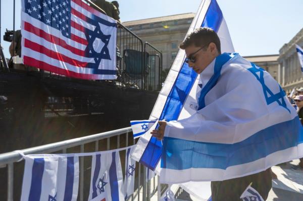 Rally-goer with Israel flag