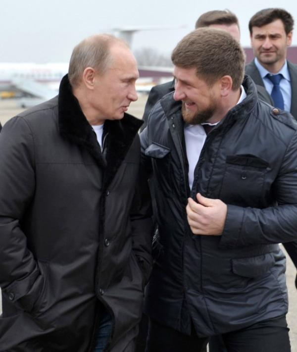 Russia's Prime Minister Vladimir Putin (L) speaks with Chechnya's leader Ramzan Kadyrov (R) while arriving in the province's second-largest city, Gudermes, on December 20, 2011. AFP PHOTO/ RIA-NOVOSTI/ALEXEI NIKOLSKY (Photo by ALEXEI NIKOLSKY / RIA NOVOSTI / AFP) (Photo by ALEXEI NIKOLSKY/RIA NOVOSTI/AFP via Getty Images)