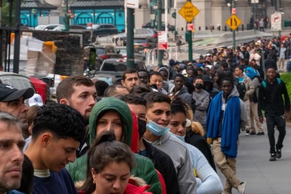 Hundreds of asylum seekers line up outside of the Jacob K. Javits Federal Building on June 6, 2023 in New York City.