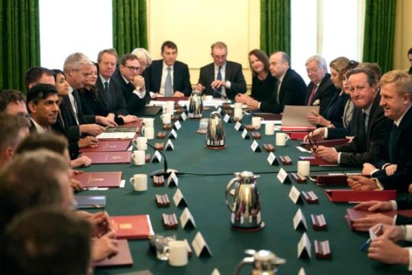 Britain's Prime Minister Rishi Sunak (L) chairs a cabinet meeting with his new cabinet including Britain's Foreign Secretary David Cameron (R) at 10 Downing Street in central Lo<em></em>ndon on November 14, 2023 following a reshuffle. (Photo by Kin CHEUNG / POOL / AFP) (Photo by KIN CHEUNG/POOL/AFP via Getty Images)