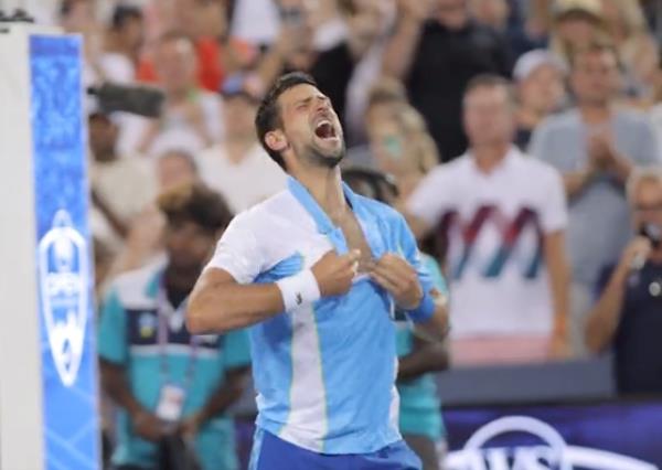 Novak Djokovic rips his shirt after winning the Cincinnati Open. 