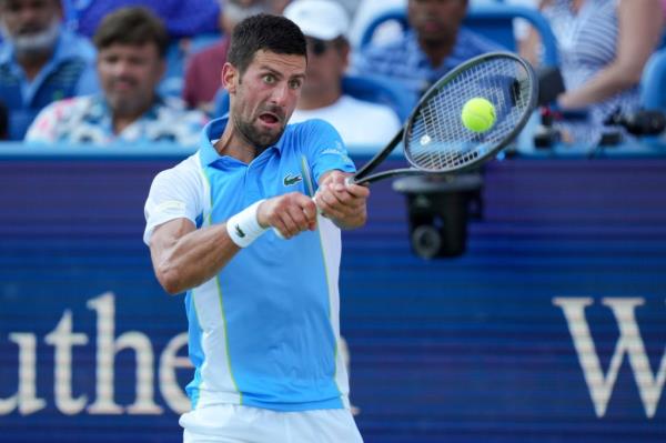 Novak Djokovic returns a shot during his match against Carlos Alcaraz on Aug. 20. 