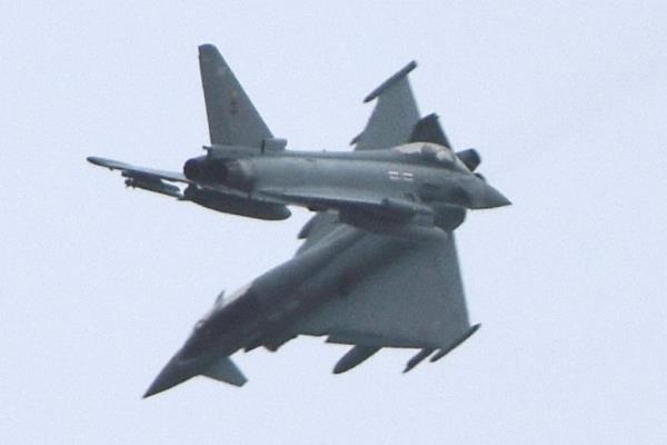 Two RAF fighter jets appeared to nearly collide during a training exercise in England.