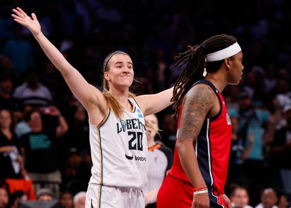 Sabrina Io<em></em>nescu celebrates after the Liberty's 90-85 series-clinching OT victory over Natasha Cloud and the Mystics.