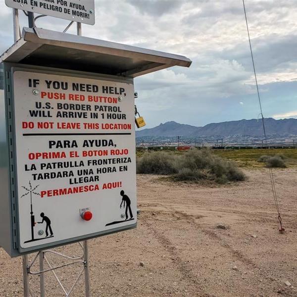 Bilingual safety placards are now in high-traffic smuggling areas of the remote desert in an effort to prevent more deaths.