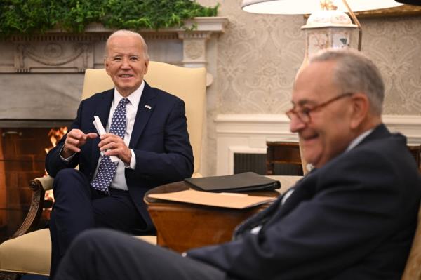 President Joe Biden (L) meets with Senate Majority Leader Chuck Schumer at the Oval Office of the White House in Washington, DC on January 27, 2024.