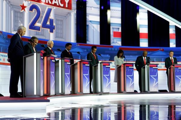 Republican presidential candidates, from left, former Arkansas Gov. Asa Hutchinson, former New Jersey Gov. Chris Christie, former Vice President Mike Pence, Florida Gov. Ron DeSantis, businessman Vivek Ramaswamy, former U.N. Ambassador Nikki Haley, Sen. Tim Scott, R-S.C., and North Dakota Gov. Doug Burgum.