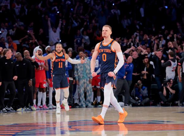 Do<em></em>nte DiVincenzo celebrates his game-winning shot during the Knicks' Game 2 win over the 76ers.