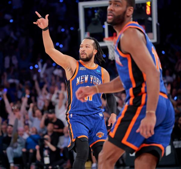 Knicks guard Jalen Brunson #11 reacts after he hits a three point shot during the second quarter.