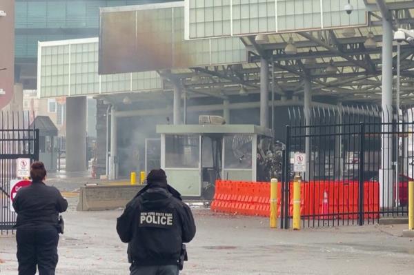 New York police officers near scene of Rainbow Bridge explosion