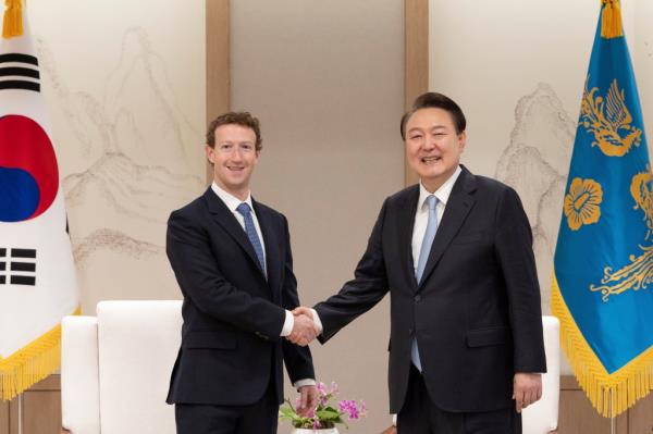 me<em></em>taa CEO Mark Zuckerberg shakes hands with South Korean President Yoon Suk Yeol during his visit to Seoul on Feb. 29, 2024.