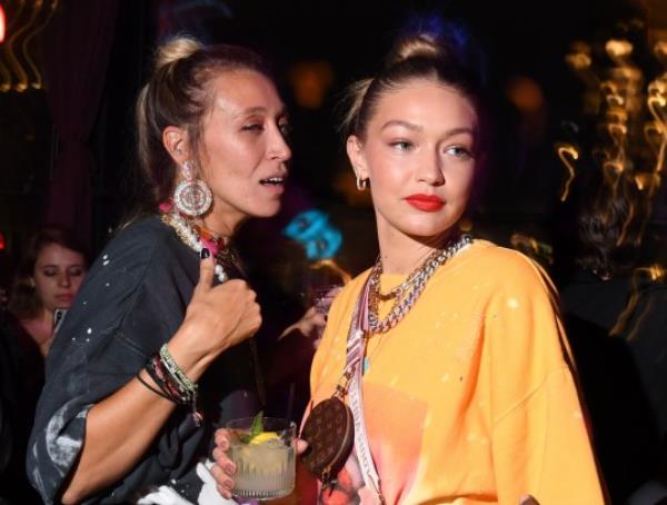 Alana Hadid and Gigi Hadid (Photo by Stephen Lovekin/WWD/Penske Media via Getty Images)