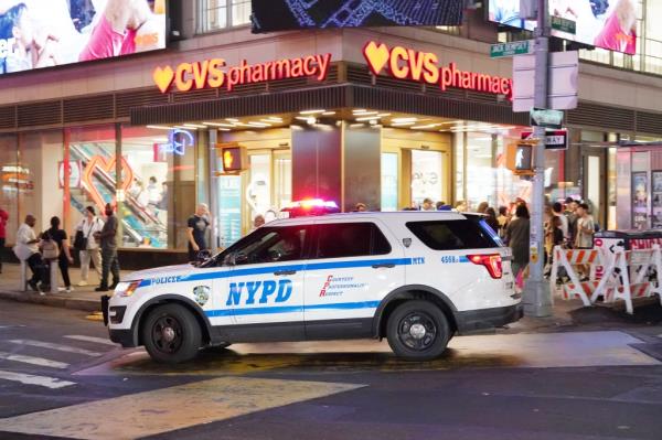 Police at the scene of the CVS killing.