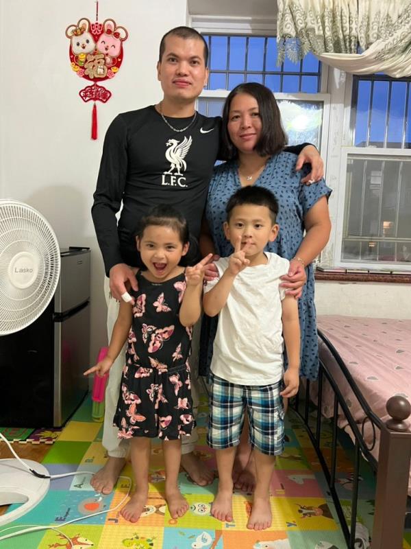 Family standing in hospital