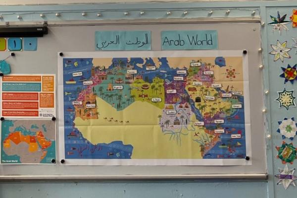 the co<em></em>ntroversial map which omits israel hanging on a classroom wall