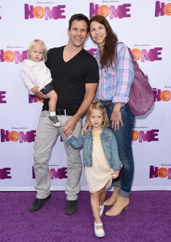 Actor Christian Oliver, wife Jessica Mazur and their children arrive at the Los Angeles premiere of 'HOME' at Regency Village Theatre on March 22, 2015 in Westwood, California