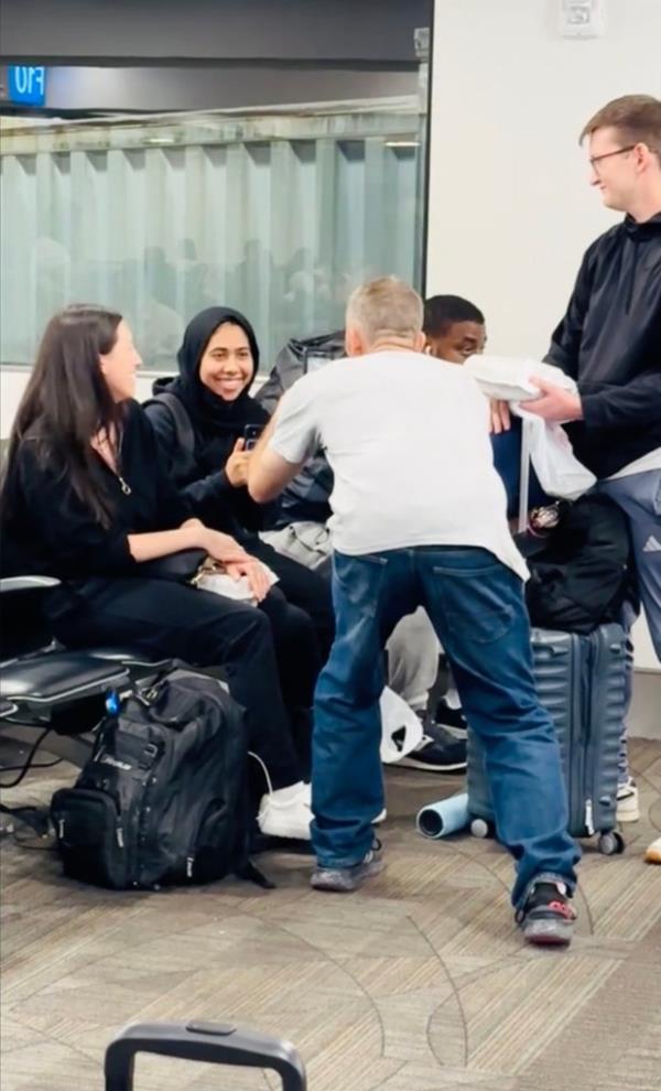 An incident in which a man harassed a woman wearing a hijab at Fort Lauderdale-Hollywood Internatio<em></em>nal Airport on Mo<em></em>nday night has gone viral, after a fellow traveler recorded the encounter. The woman told the Miami Herald said she was shaken by how long it took officials to help her. Salma Khan, the Muslim woman verbally accosted at the airport, said she was 15 minutes from boarding her flight to Phoenix when the incident occurred. Khan, 27, originally from South Florida, sat on one of the o<em></em>nly partly empty rows of seats as the airport was crowded with Thanksgiving travelers. She then noticed a man staring at her. aIam a visible Muslim woman. I wanted to make him comfortable, so I introduced myself,a Khan said. The man then told Khan that he was ahappy this was happeninga and alluded to wanting to remove her hijab. She asked him to leave her alone and jumped out of her seat when two strangers rushed in to help.